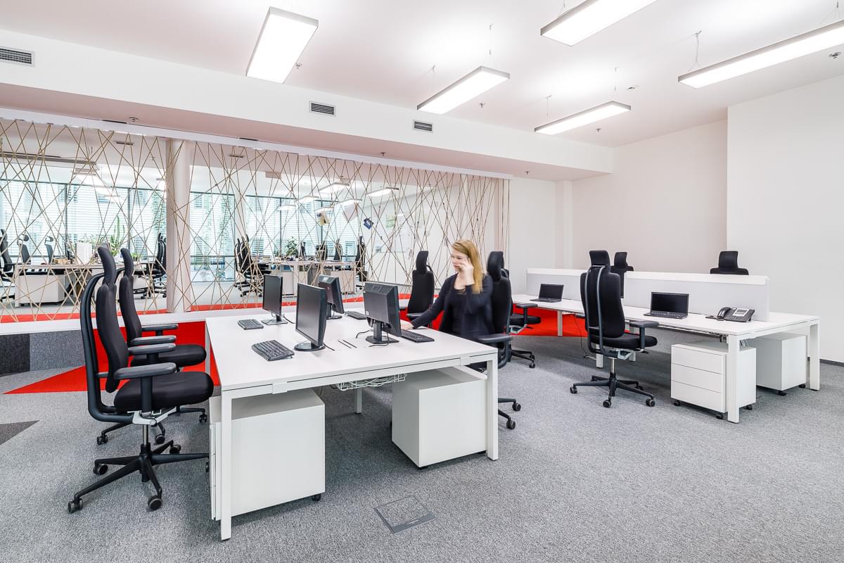 Open space office zone in corporate colors list of company Seznam.cz