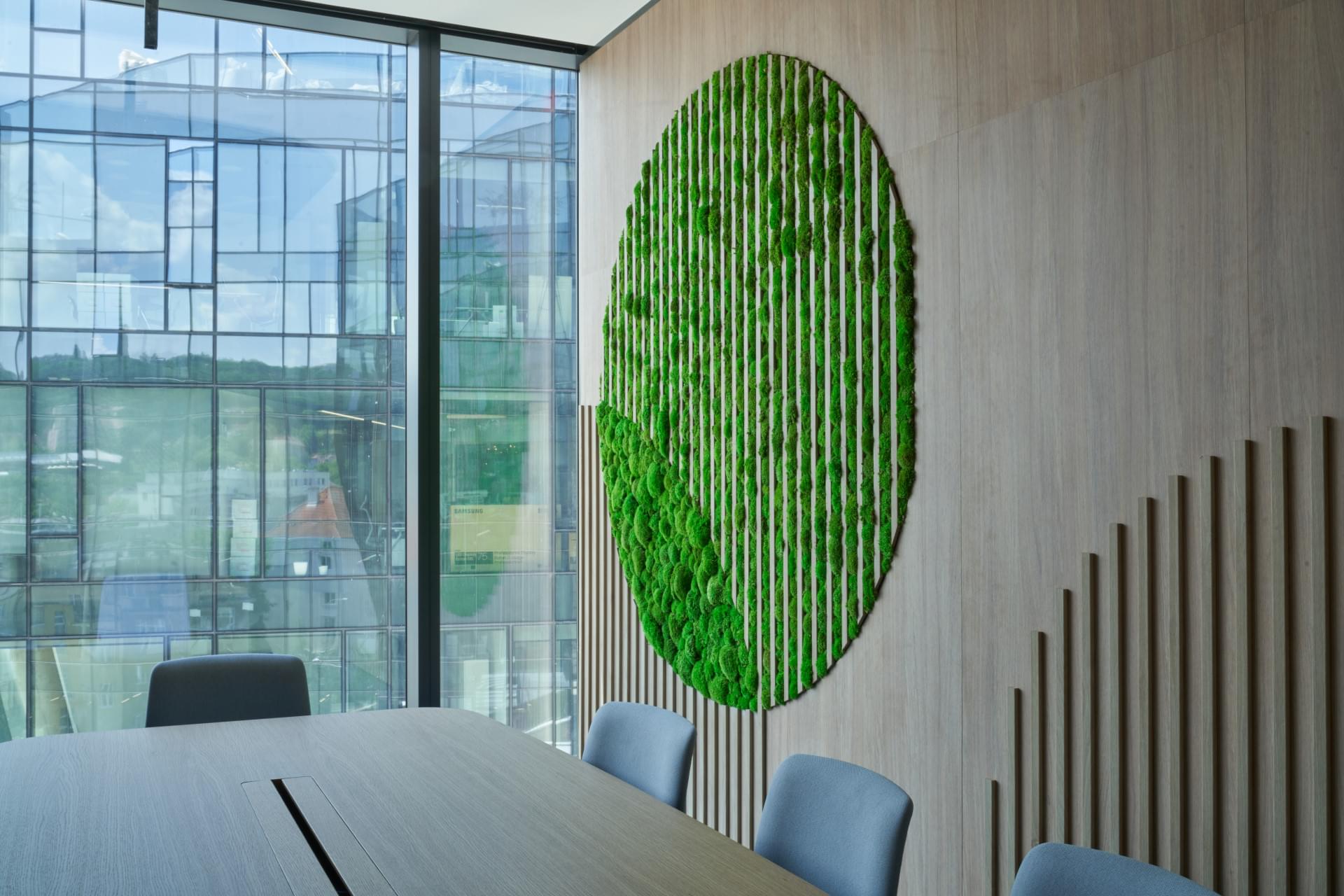 meeting room with green moss element on the wall