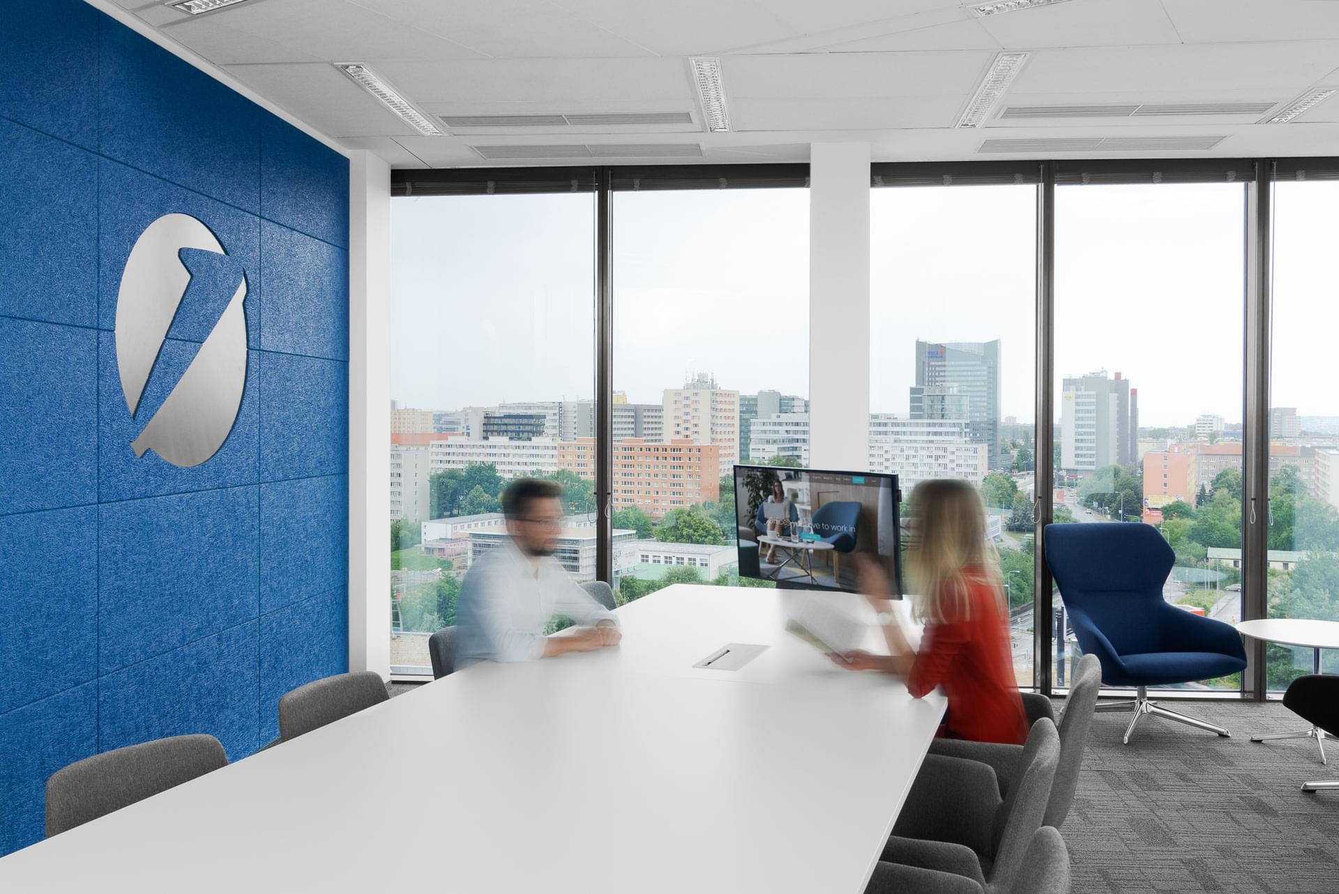 office with a view on the doorstep and a dominant logo on the wall