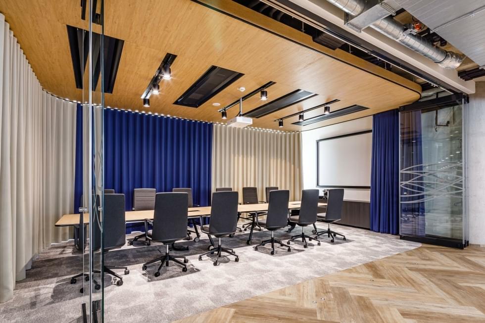 large meeting room with curtains and glass sliding wall