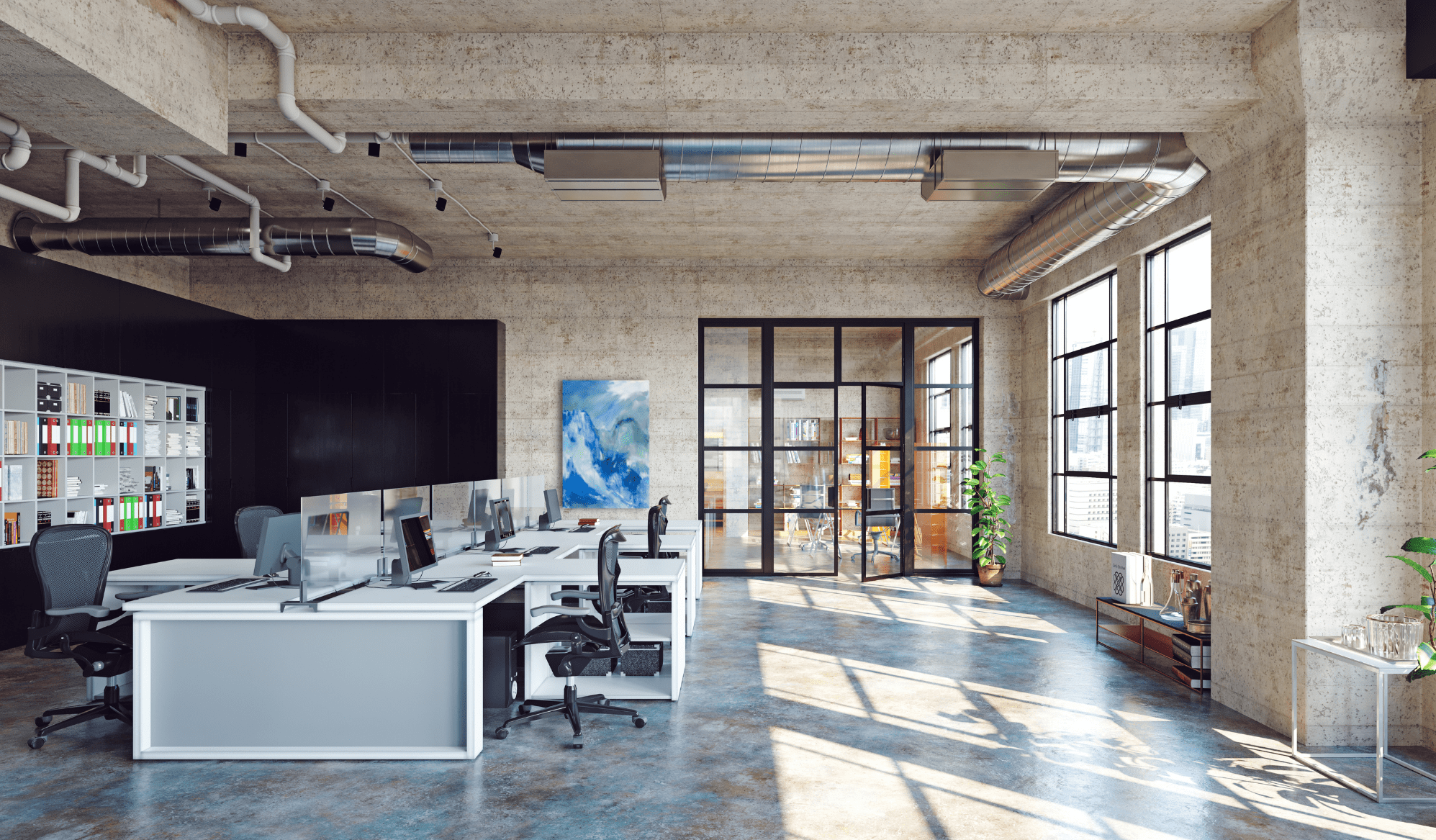 Openspace s odhaleným betonovým stropem a obrazem na stěně