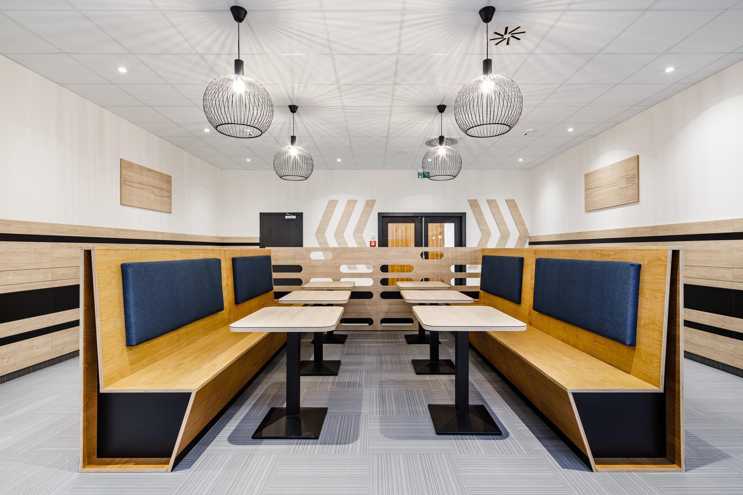 Long wooden benches made to measure for more comfort in the Canteen at BHS Oregon House