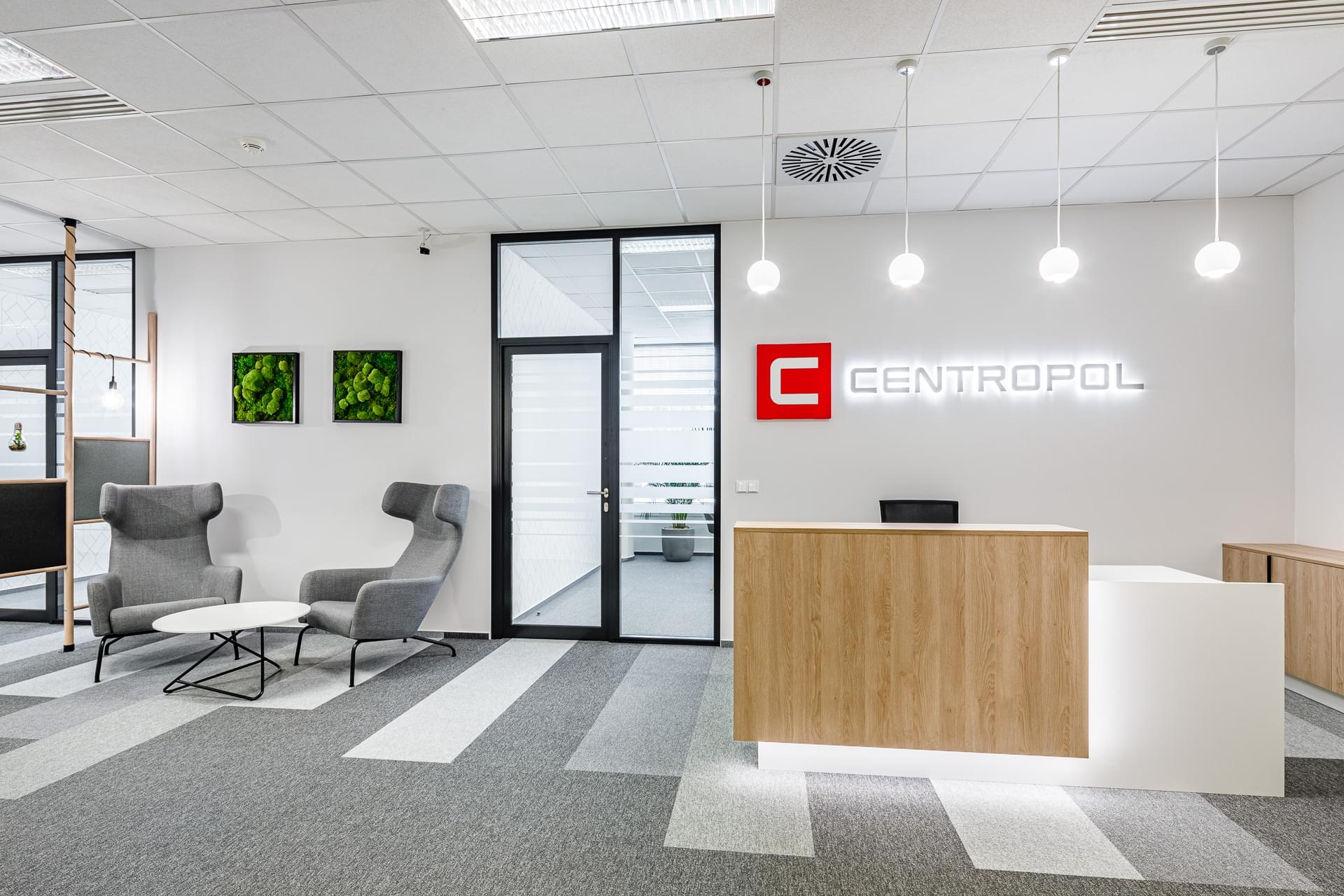 Reception with a luminous Centropol sign with a lobby corner