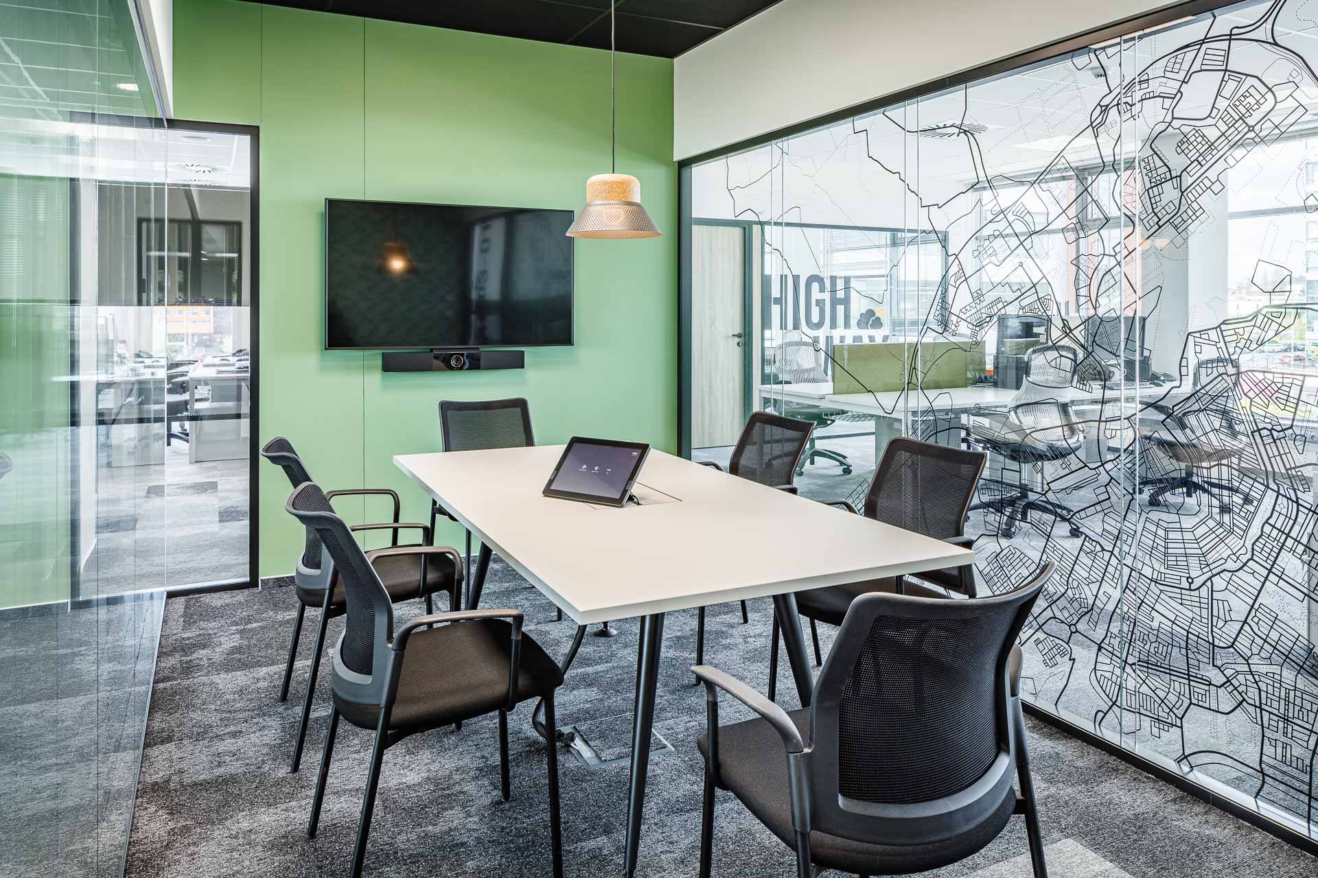 Glass meeting room with stickers on the glass