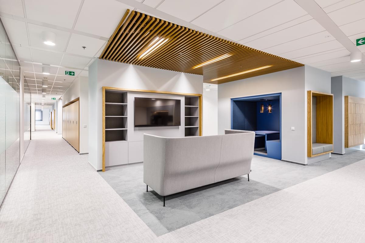 Relax zone in minimalist style with wooden decoration