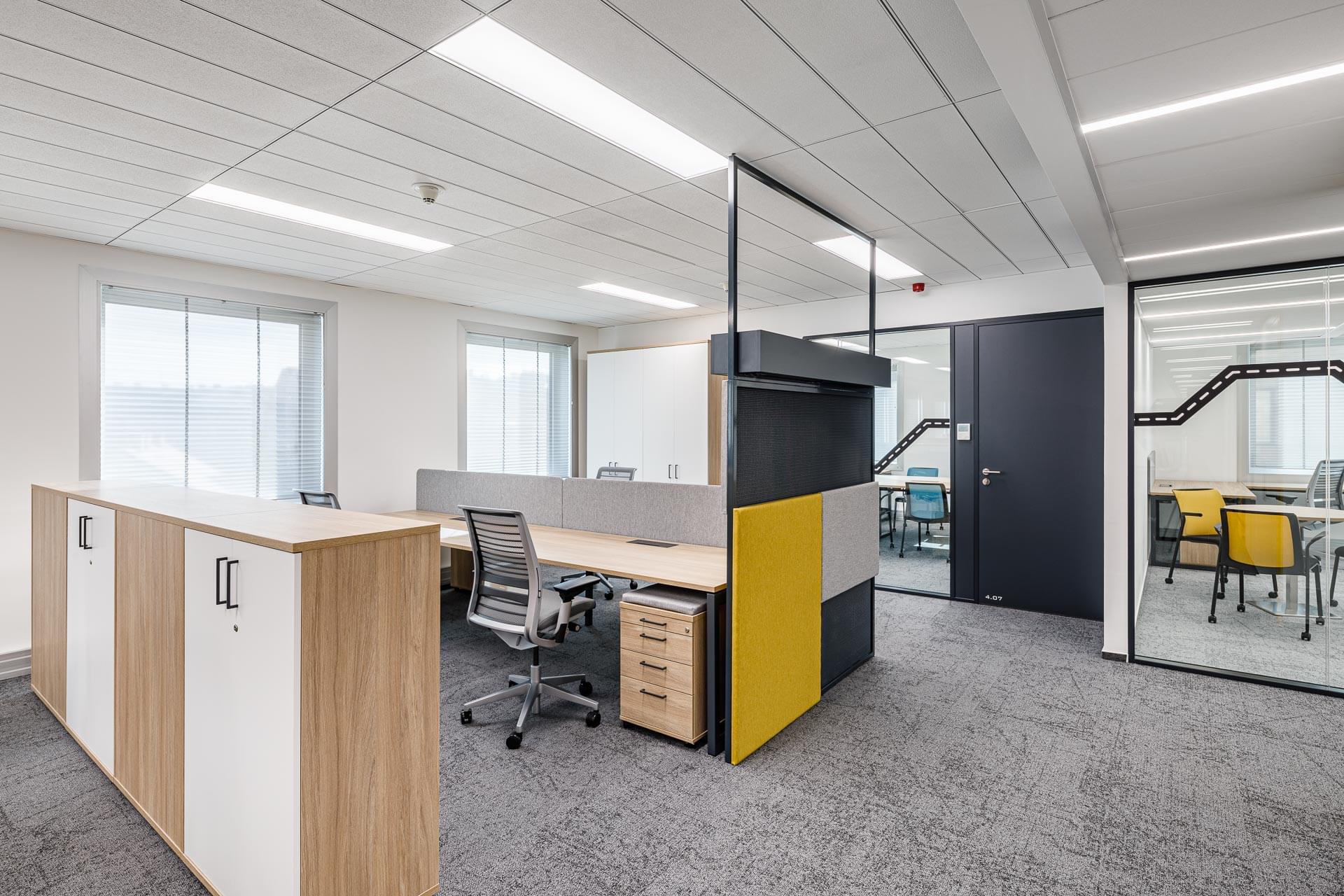 Open space office with acoustic elements and ergonomic interior at Renault