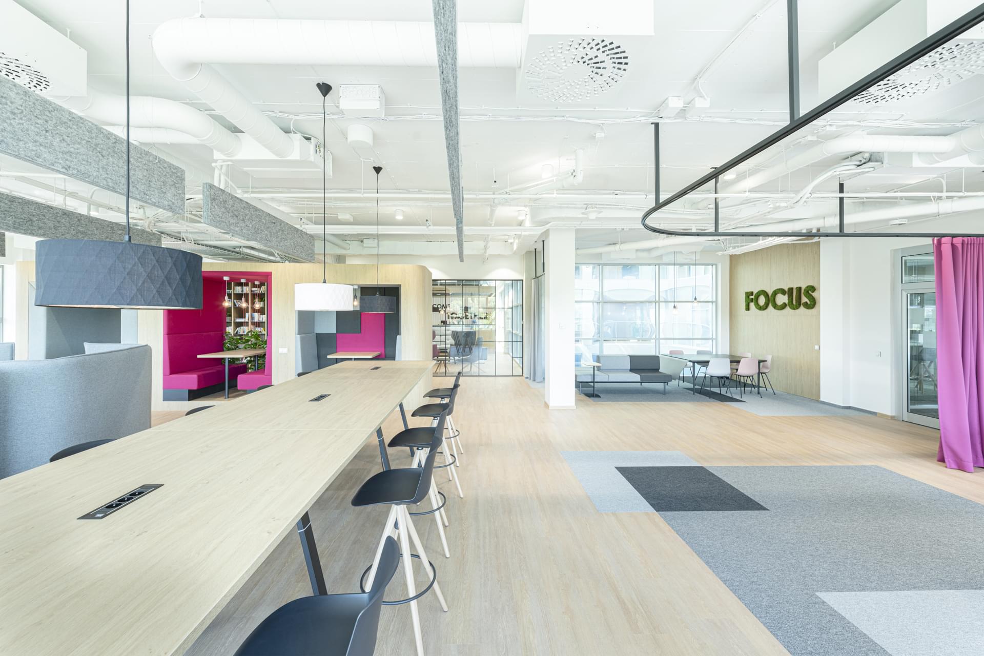 Work environment with elements of the corporate shade of magenta in the T-Mobile company