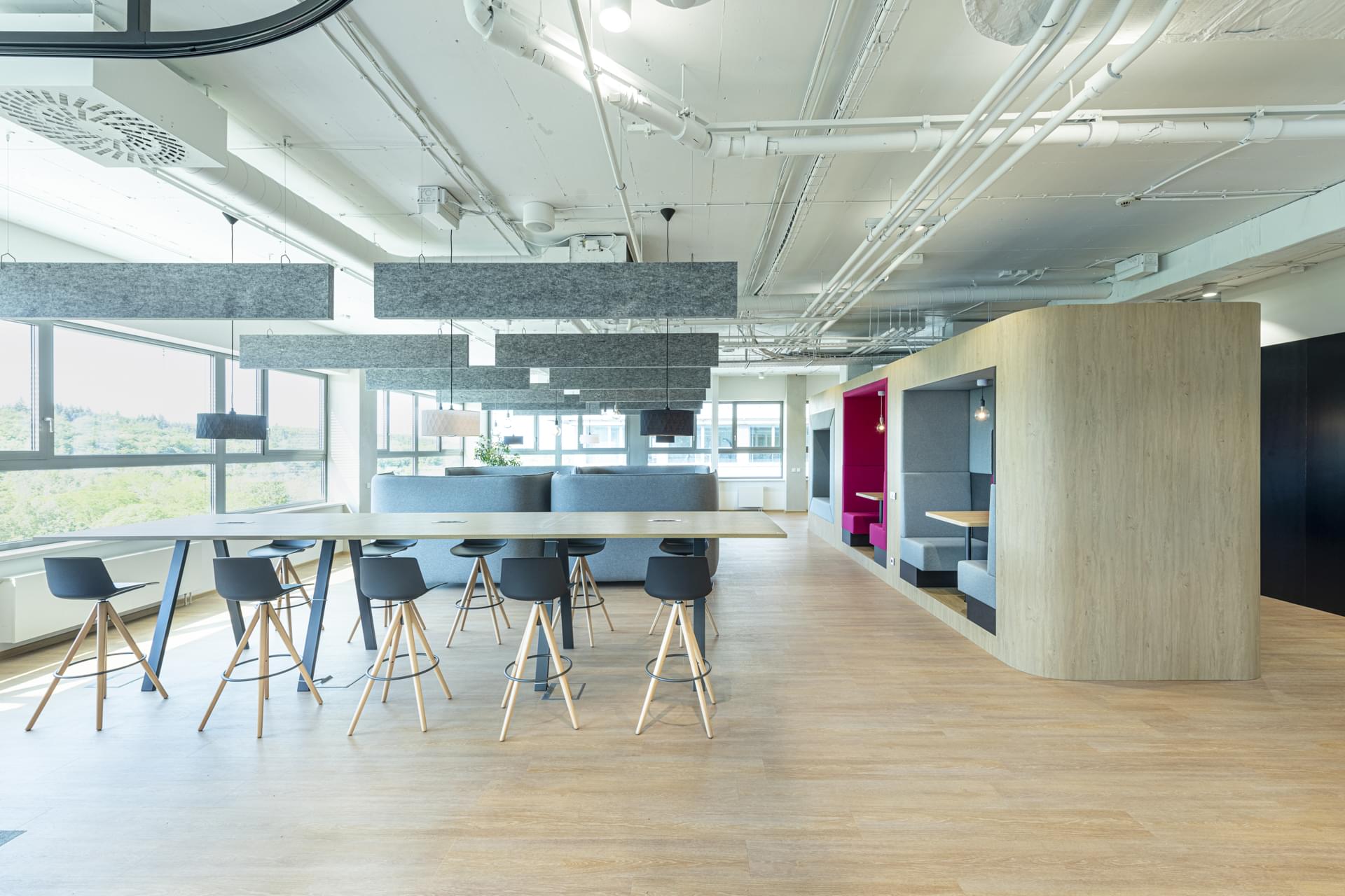 Spaces in T-Mobile offices for relaxation and work with hanging acoustic panels