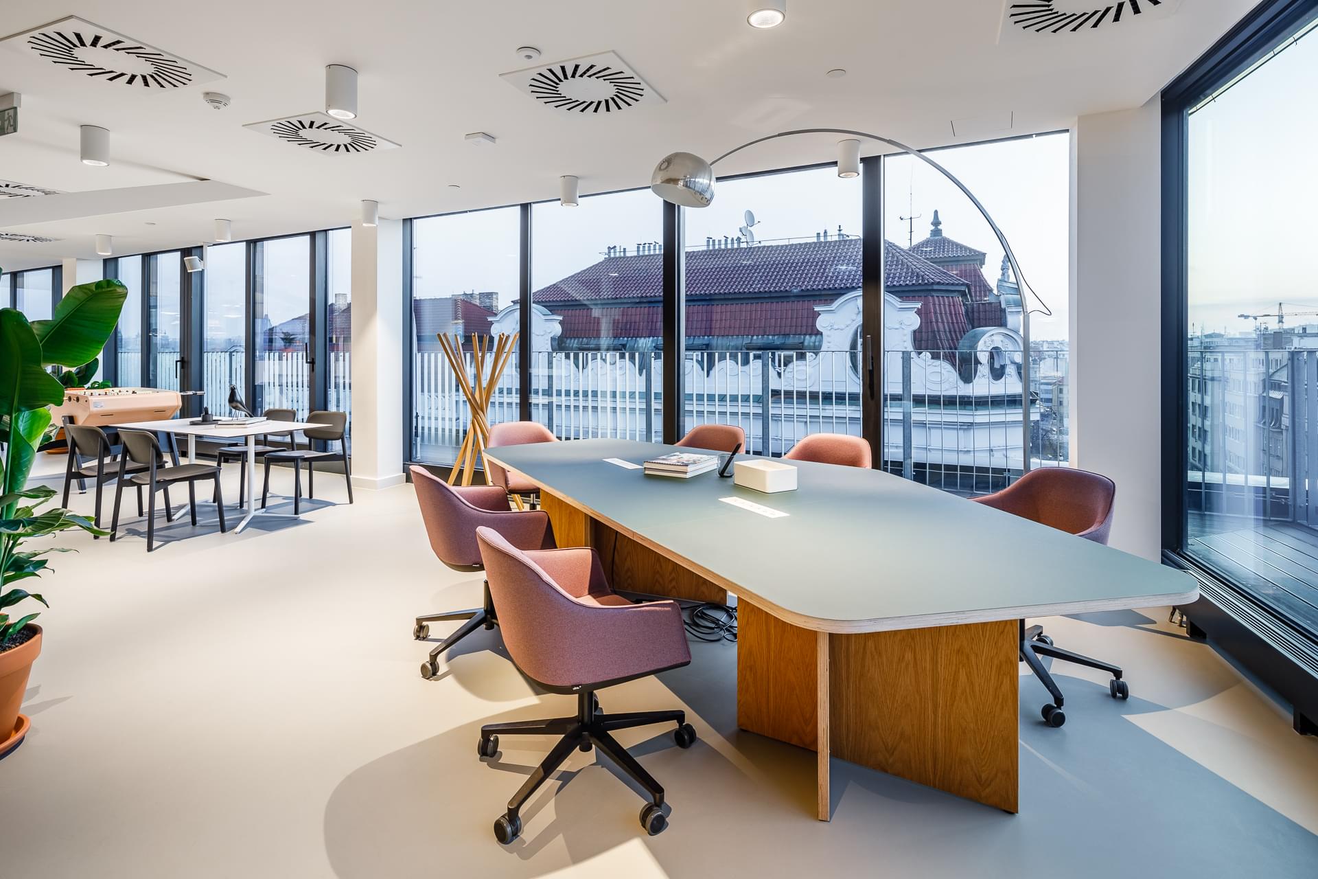 Large meeting tables serve for business club meetings