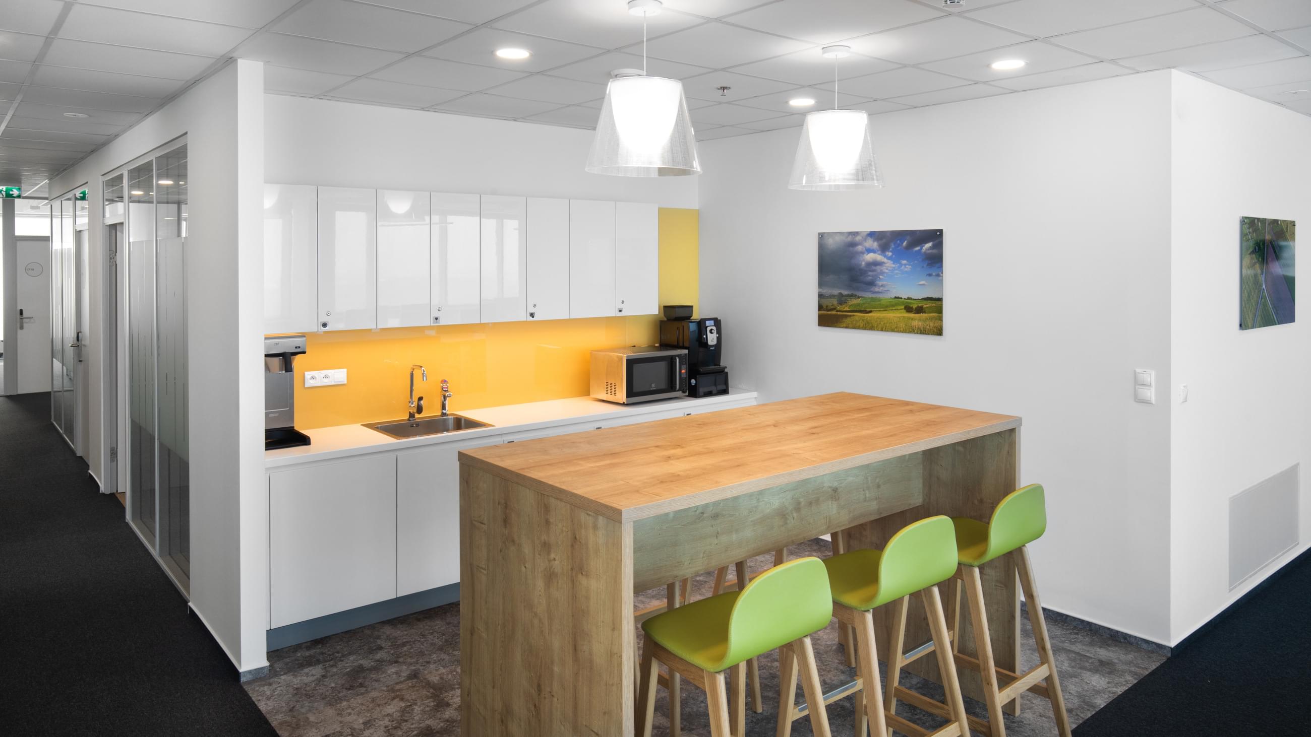 Working kitchen with large bar seating at Regus