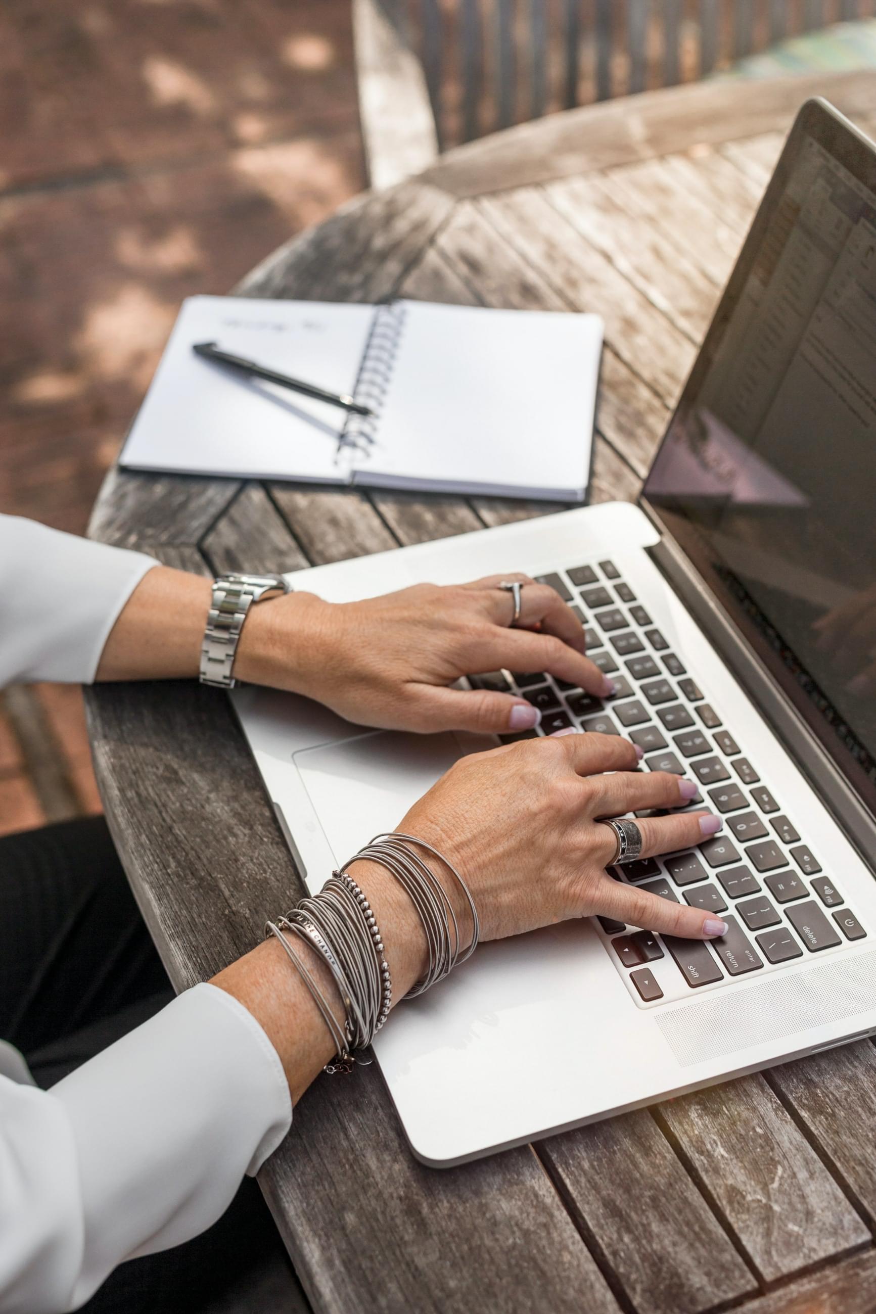  Working woman on the terrace with internet access
