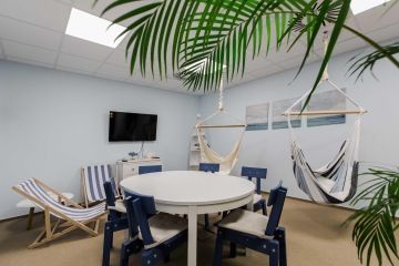 A modern beach-style meeting room at Miton