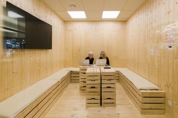 Non-traditional office space in the style of Finnish sauna with wooden interior in Miton