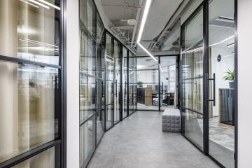 Glass corridor in grey tones