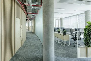 Glass dividing the offices and corridor