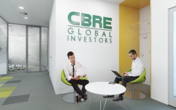 Vizualizace co-working prostoru se soft seating interiérem a logem firmy CBRE