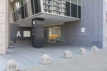 Reconstructed EUROPEUM glass entrance doors and Equiton tiles.