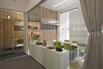 Meeting room with glass partitions.