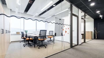 Shot of glass office space in FINGO company colors