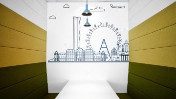 Comfortable environment with wallpaper on the wall at Regus