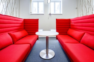 Upholstered red sofas