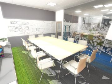 The QBE meeting room is equipped with a large white desk and white conference chairs with metal construction. The painting simulates the function of the classic label. The floor covers the carpet from the new Voxflor Color Spring collection.