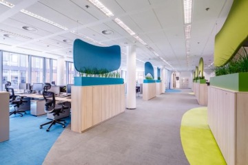 Acoustic panels dividing a large office space