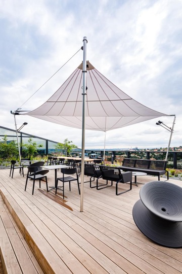 terrace with sun shading and a view of Prague