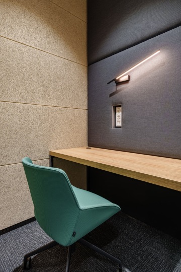 Telephone booth with chair