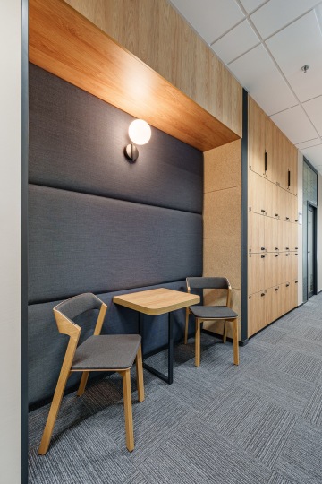Hallway with seating for two and lockers