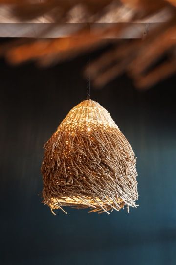 Designer light fixture made of natural materials