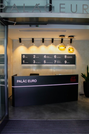 Minimalist reception in dark design with atypical lighting in Euro Palace