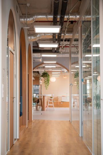 Wooden arch at the end of the corridor