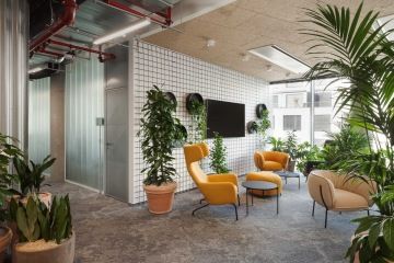 A combination of flowers and industrial elements in the relaxation area