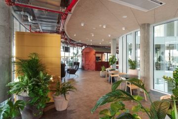 Maringotka in the middle of the office space