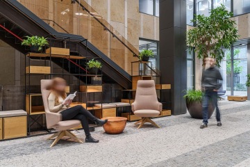 Stairs to first floor and library