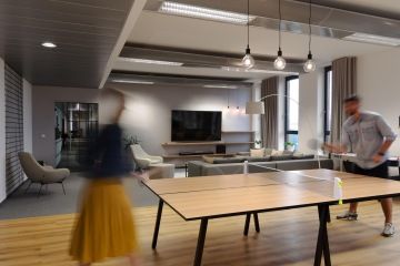 Ping-pong table in the office space for active relax during breaks