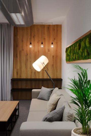 Elegant floor lamp in the corner of the office lobby