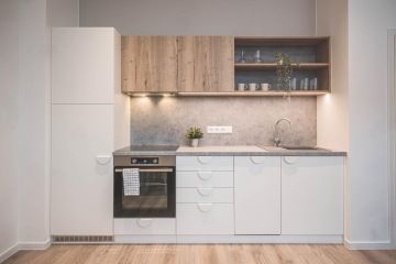 Vybavená kuchyň v bytové jednotce