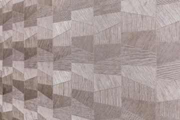 Tapeta hnědé barvy s abstraktními vzory od TopDeco .