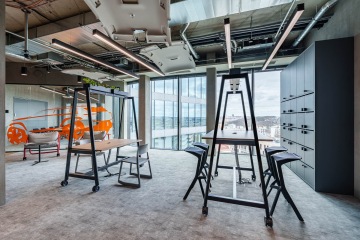 Movable tables for a flexible space