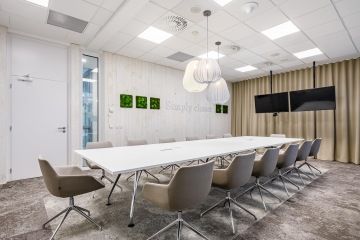 In the conference rooms, architects worked with natural motifs and slogans on the walls