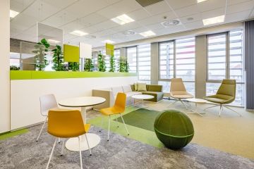 The squares motif can be seen in the T-Mobile offices, not only in the form of acoustic hanging panels, but also on the floor