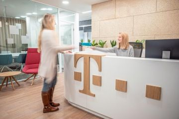 Design reception with wooden T-Mobile logo