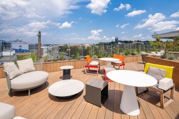 comfortable rooftop seating with a view