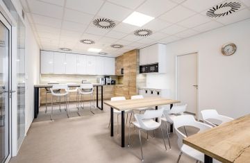 Work kitchen in a wooden decor with a bar counter at Toyota