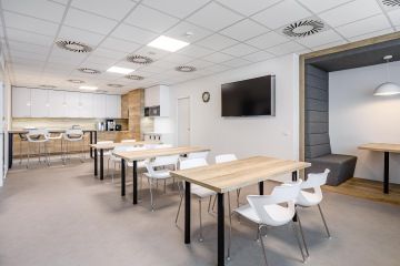 Work kitchen in a wooden decor with a bar counter at Toyota