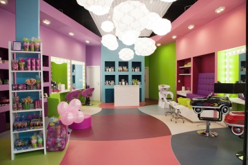 Children's hairdressing salon in OC Nové Butovice, enlightened by round white design lights and colors, gets fresh light.