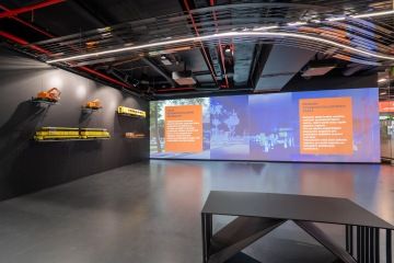 models of trains printed on a 3D printer in the information center area