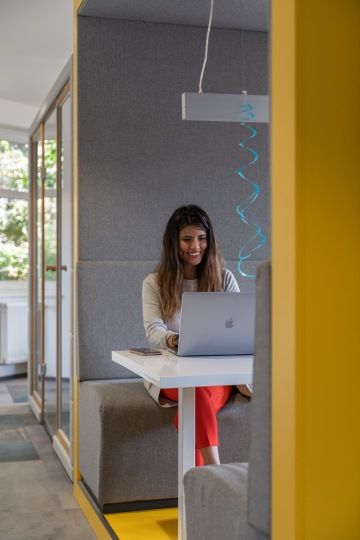 Working on a computer in a cozy environment